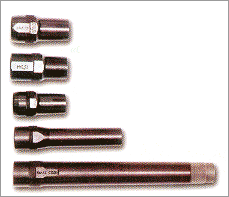 Дульные насадки к гладкоствольной "Сайге" 12-го карибра. Сверху вниз: чок, получок, улучшенный цилиндр, "парадокс" и удлинитель ствола (цилиндр)